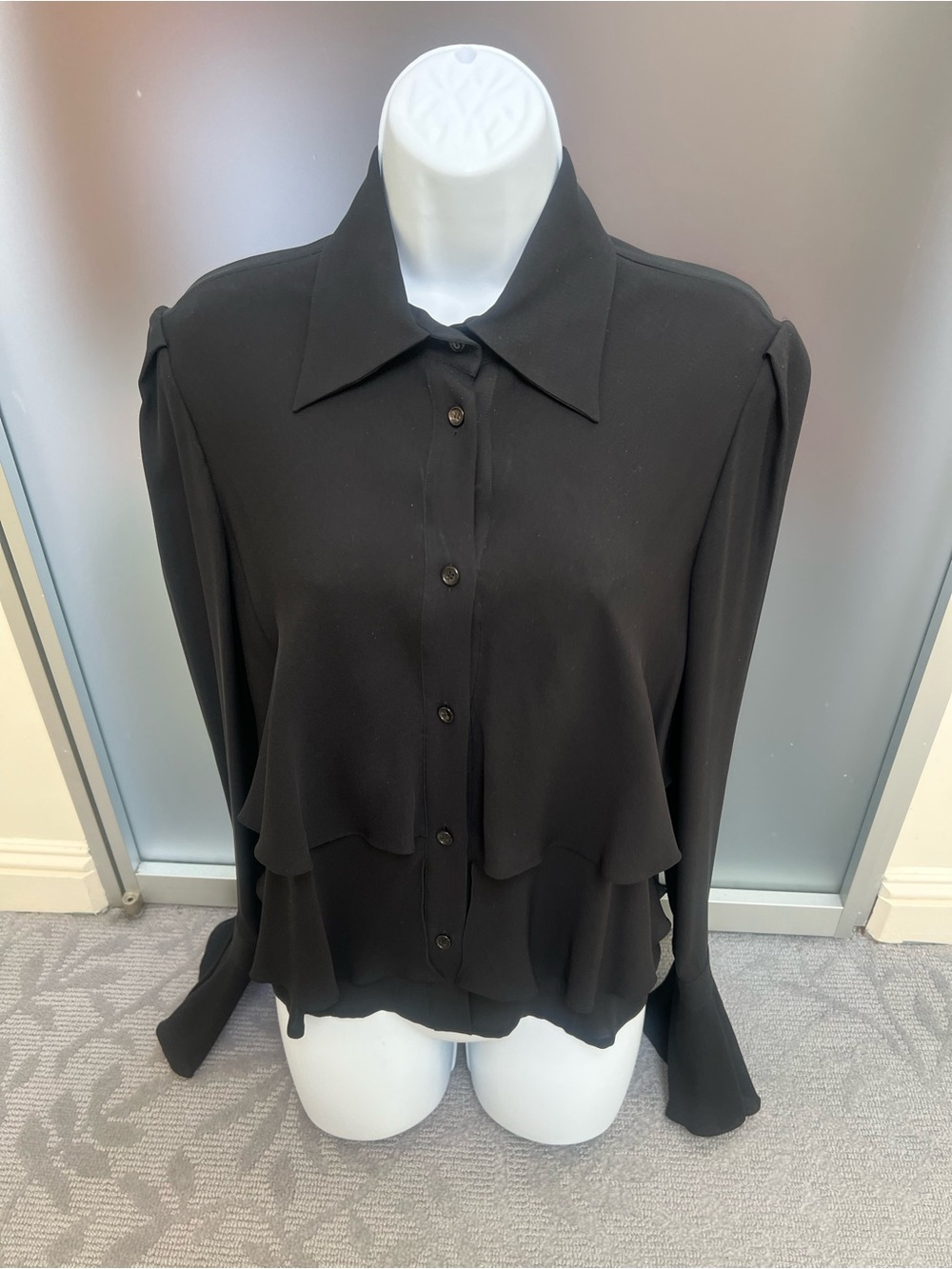Brioni Made in Italy silk blouse to be worn out just below waist. Front Ruffles